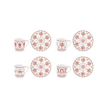 Cuatro tazas de café Exotic Vibes tangerine con platillos de palmeras